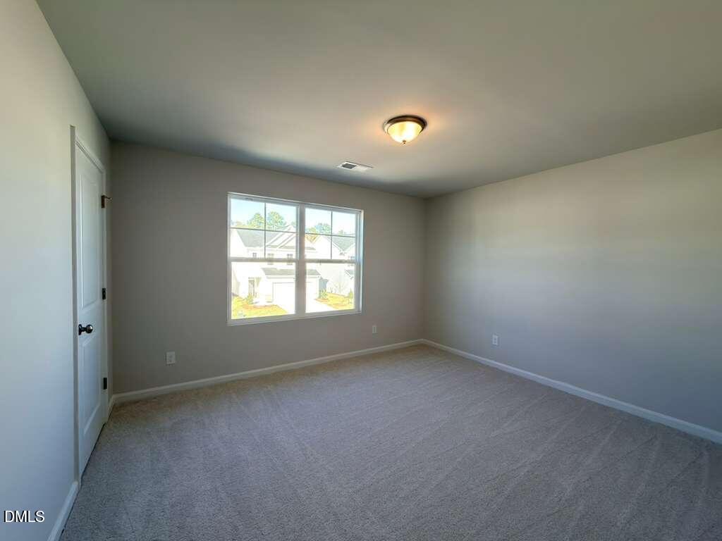 2007 English Saddle Lane Durham, NC 27703 - Photo 30 of 45 an empty room with a window