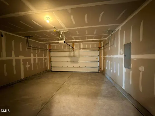 a view of an empty room with racks on the wall