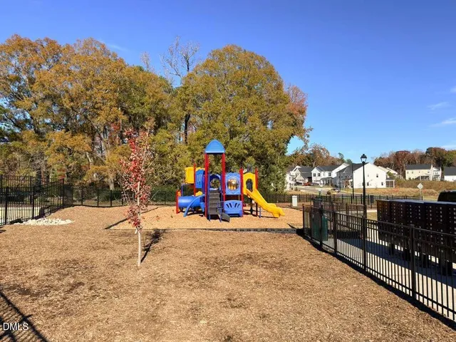 a view of a park with swings