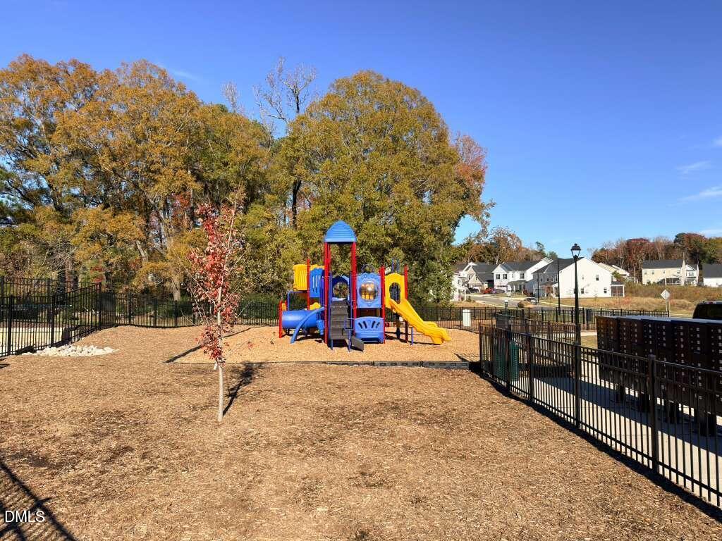 2007 English Saddle Lane Durham, NC 27703 - Photo 44 of 45 a view of a park with swings