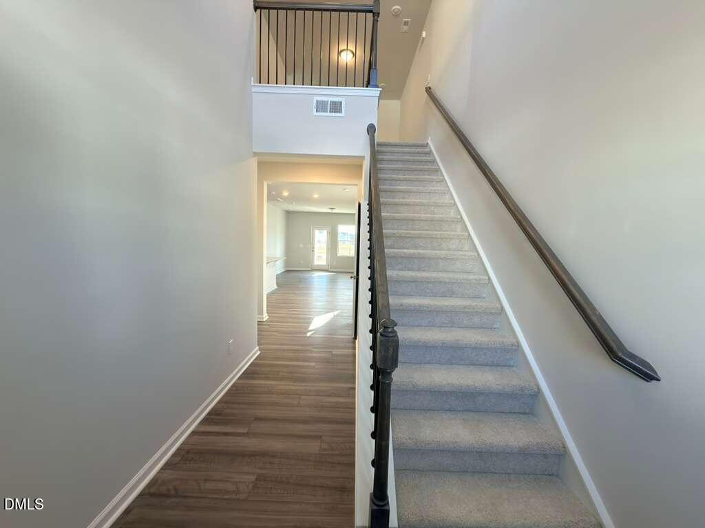 2007 English Saddle Lane Durham, NC 27703 - Photo 5 of 45 a view of entryway and hall with wooden floor