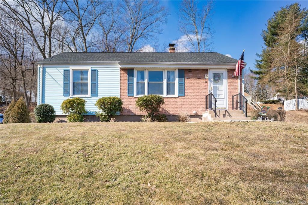 47 Parkview Road Wallingford, CT 06492 - Photo 1 of 1 a front view of a house with garden