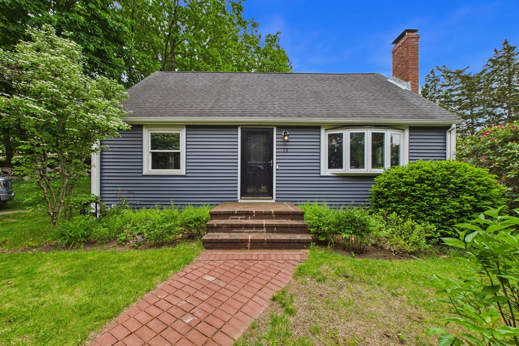 70 Neponset Street Canton, MA 02021 - Photo 2 of 39 a front view of a house with a yard