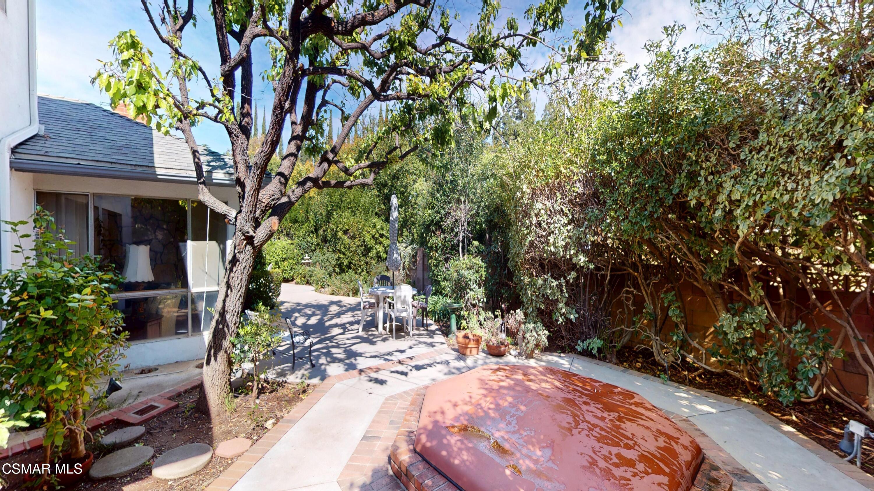 10900 Des Moines Avenue Porter Ranch, CA 91326 - Photo 37 of 38 a view of a backyard