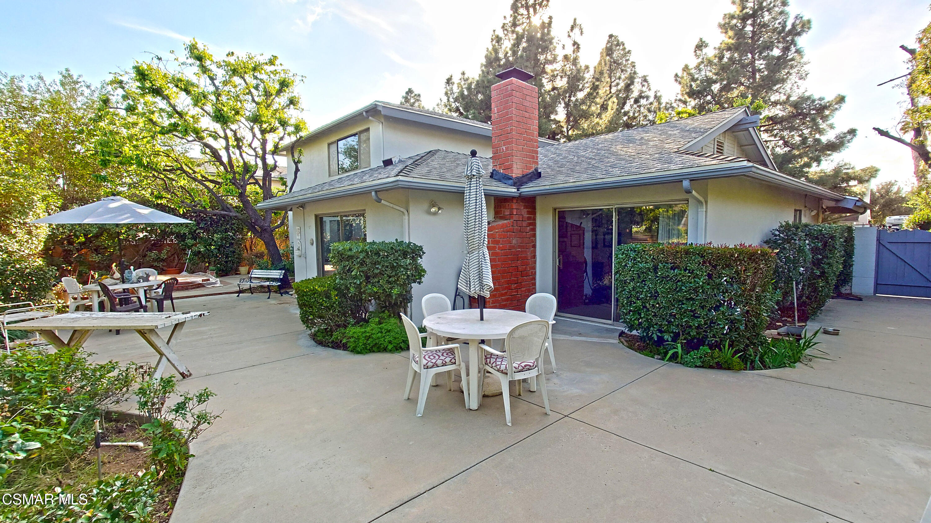 10900 Des Moines Avenue Porter Ranch, CA 91326 - Photo 38 of 38 a front view of a house with garden