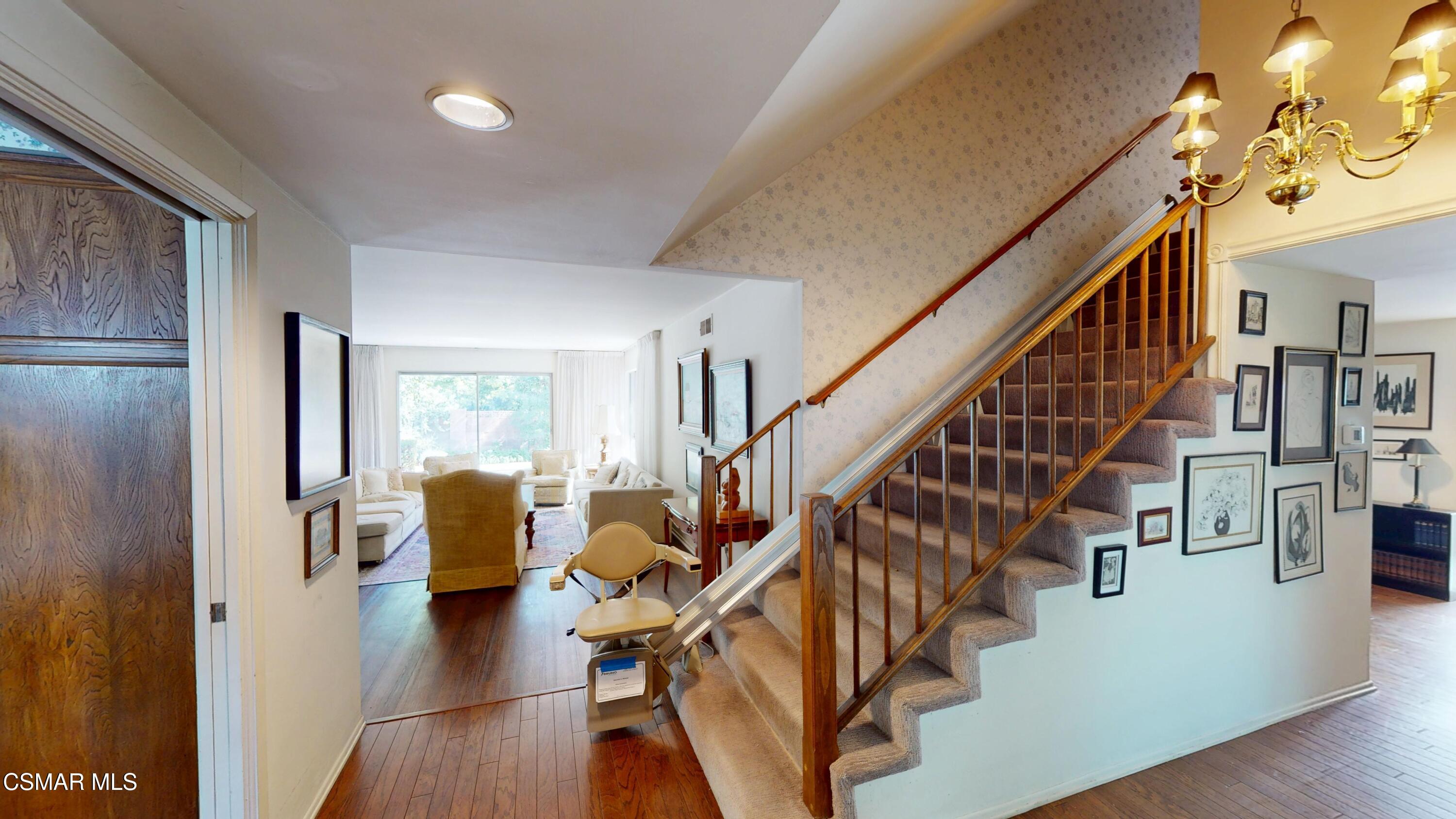 10900 Des Moines Avenue Porter Ranch, CA 91326 - Photo 5 of 38 a view of entryway and hall with wooden floor