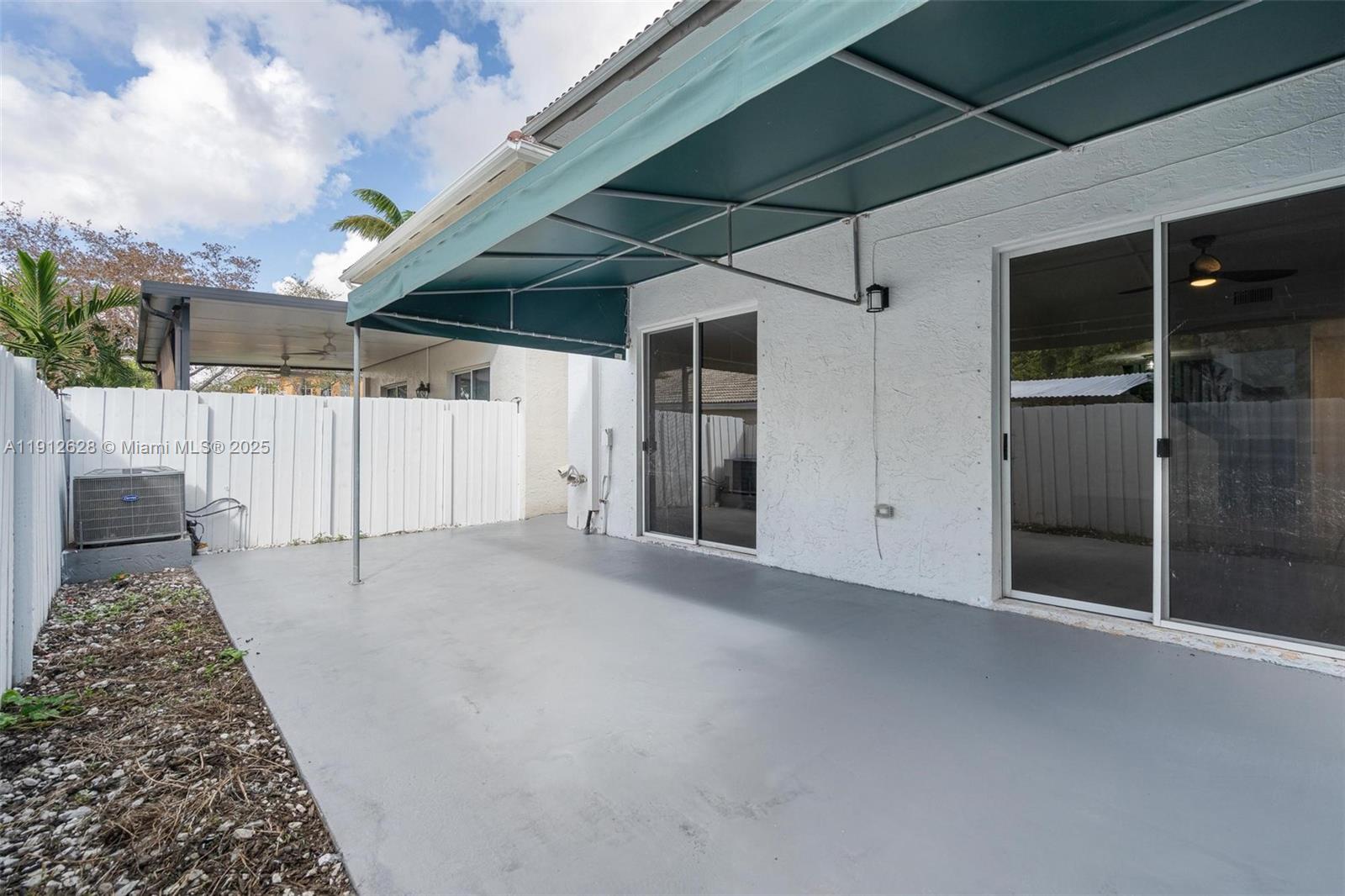 8658 Southwest 159th Court Miami, FL 33193 - Photo 16 of 30 a view of a porch