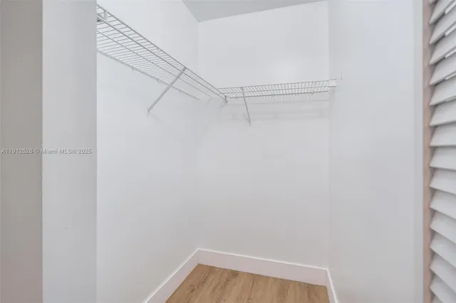 a view of a room with racks on the wall