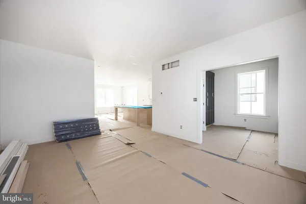 a view of an empty room and window