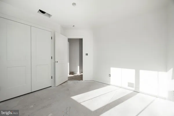 a bathroom with a tub and shower