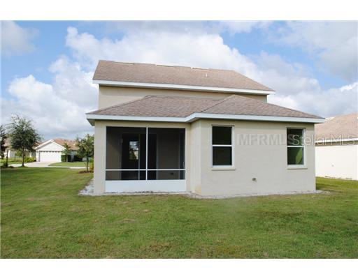 15207 Skip Jack Loop Lakewood Ranch, FL 34202 - Photo 3 of 11 Exterior Back