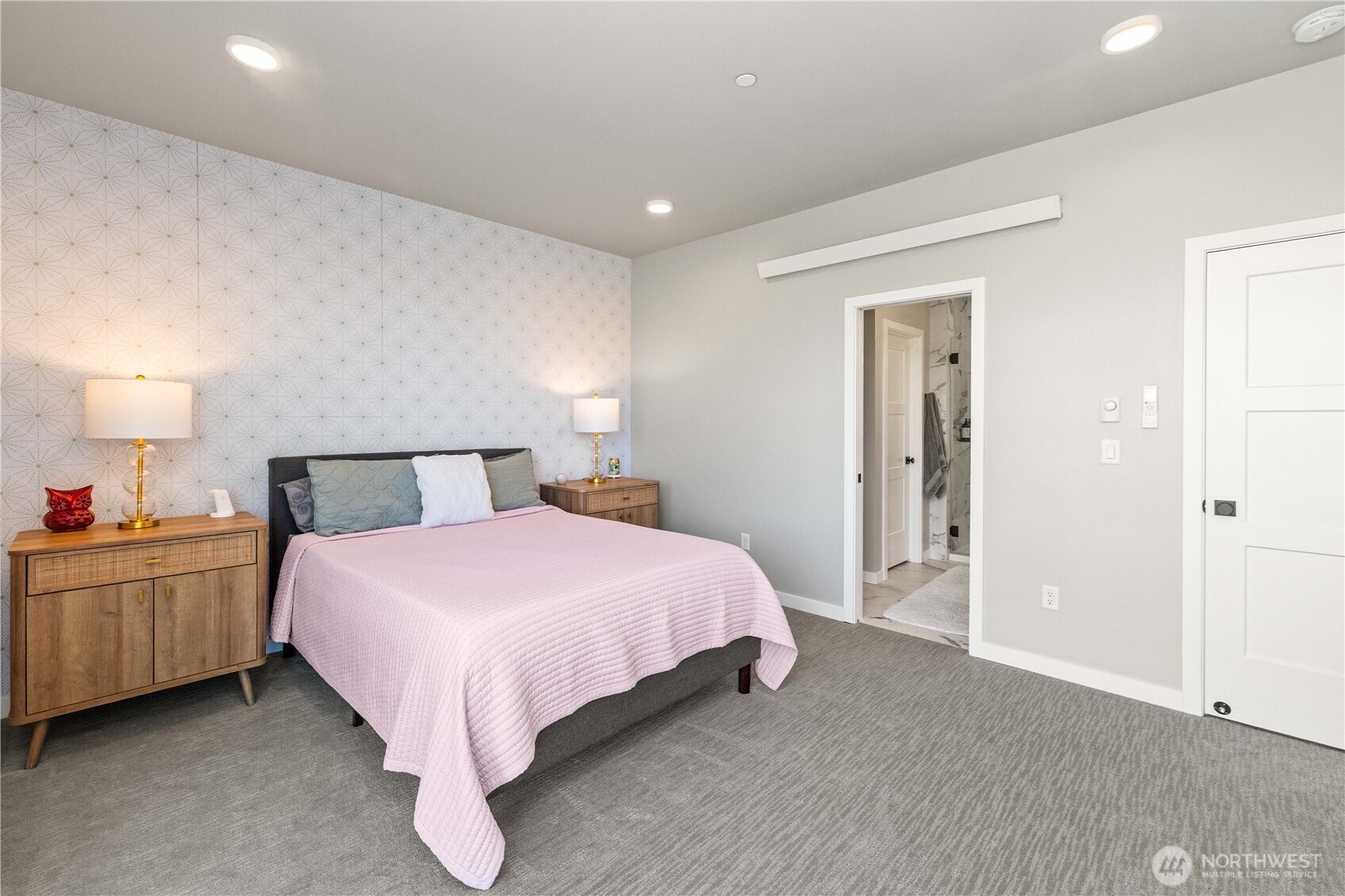 1208 Harrington Avenue Northeast Renton, WA 98056 - Photo 18 of 40 a bedroom with a bed and a cabinets