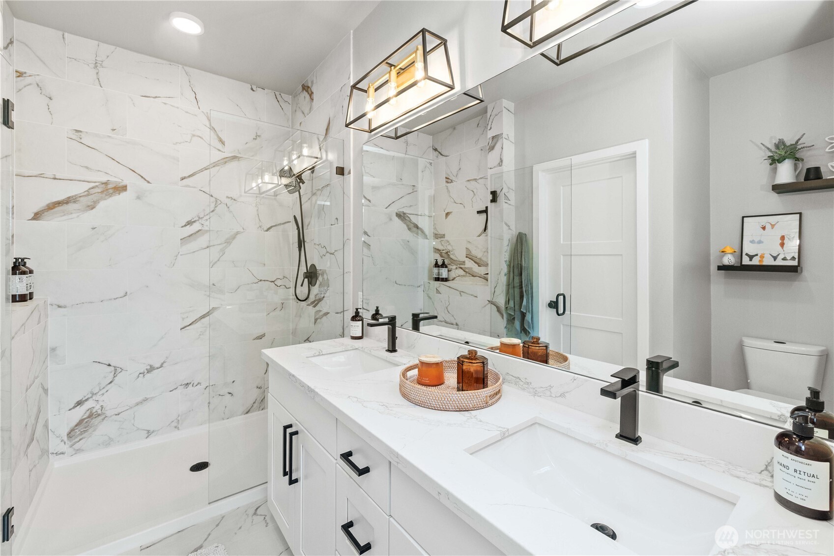 1208 Harrington Avenue Northeast Renton, WA 98056 - Photo 20 of 40 a bathroom with a sink vanity granite tub shower and mirror