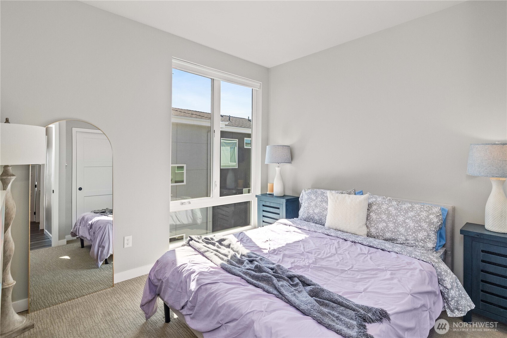 1208 Harrington Avenue Northeast Renton, WA 98056 - Photo 21 of 40 a bedroom with a bed and a window