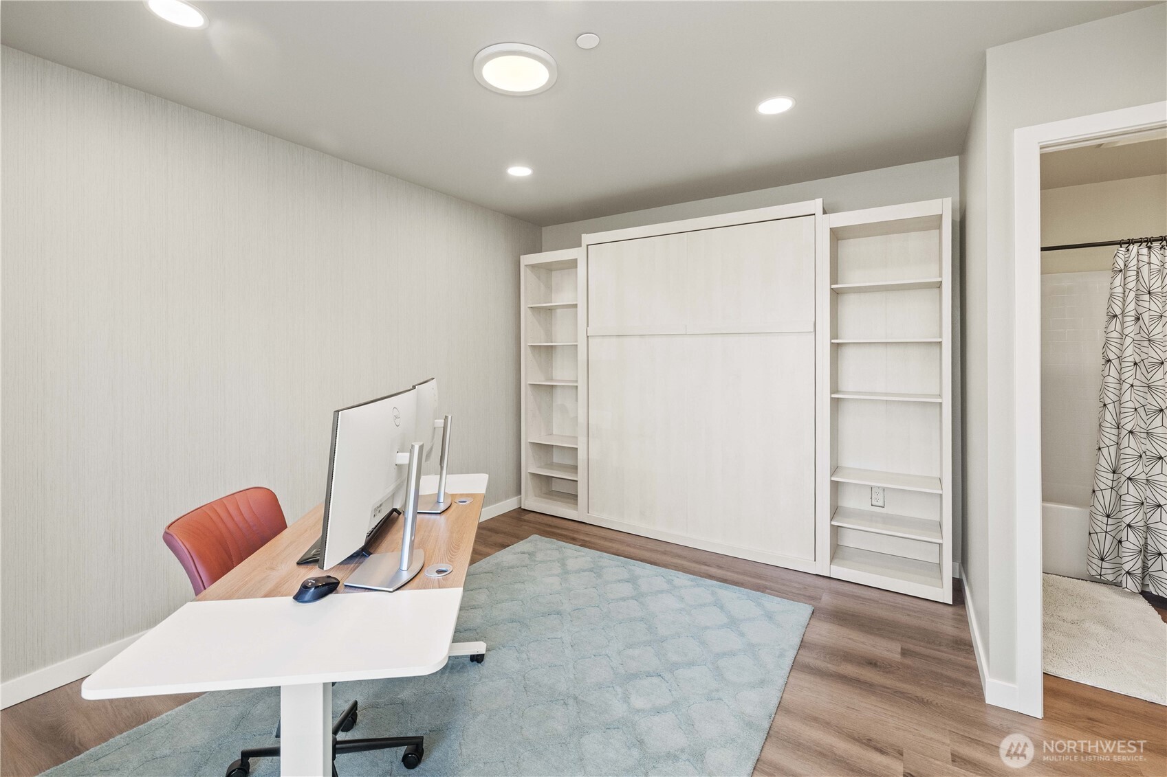 1208 Harrington Avenue Northeast Renton, WA 98056 - Photo 28 of 40 a view of room with furniture and wooden floor