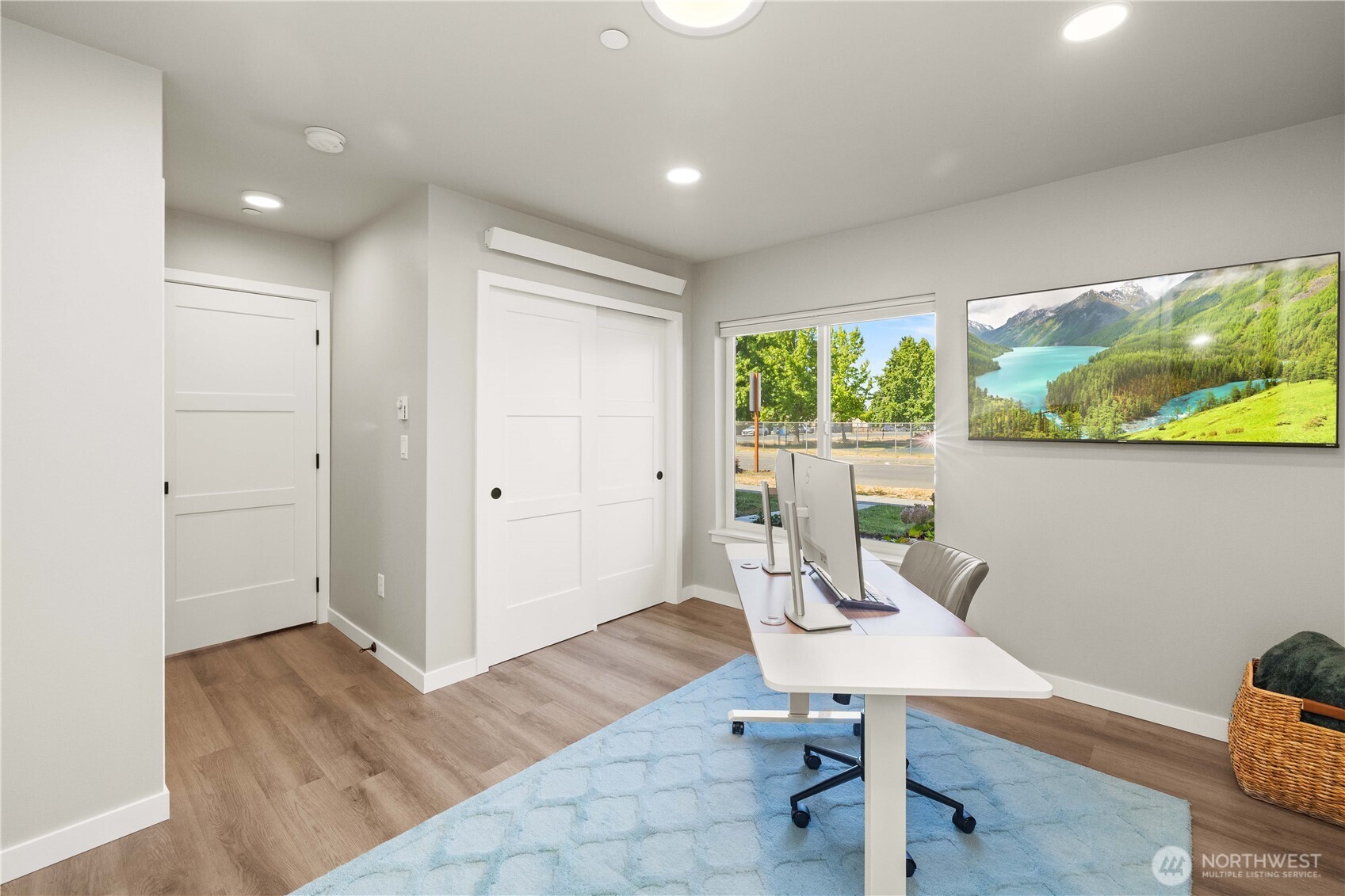 1208 Harrington Avenue Northeast Renton, WA 98056 - Photo 29 of 40 a workspace with furniture window and wooden floor