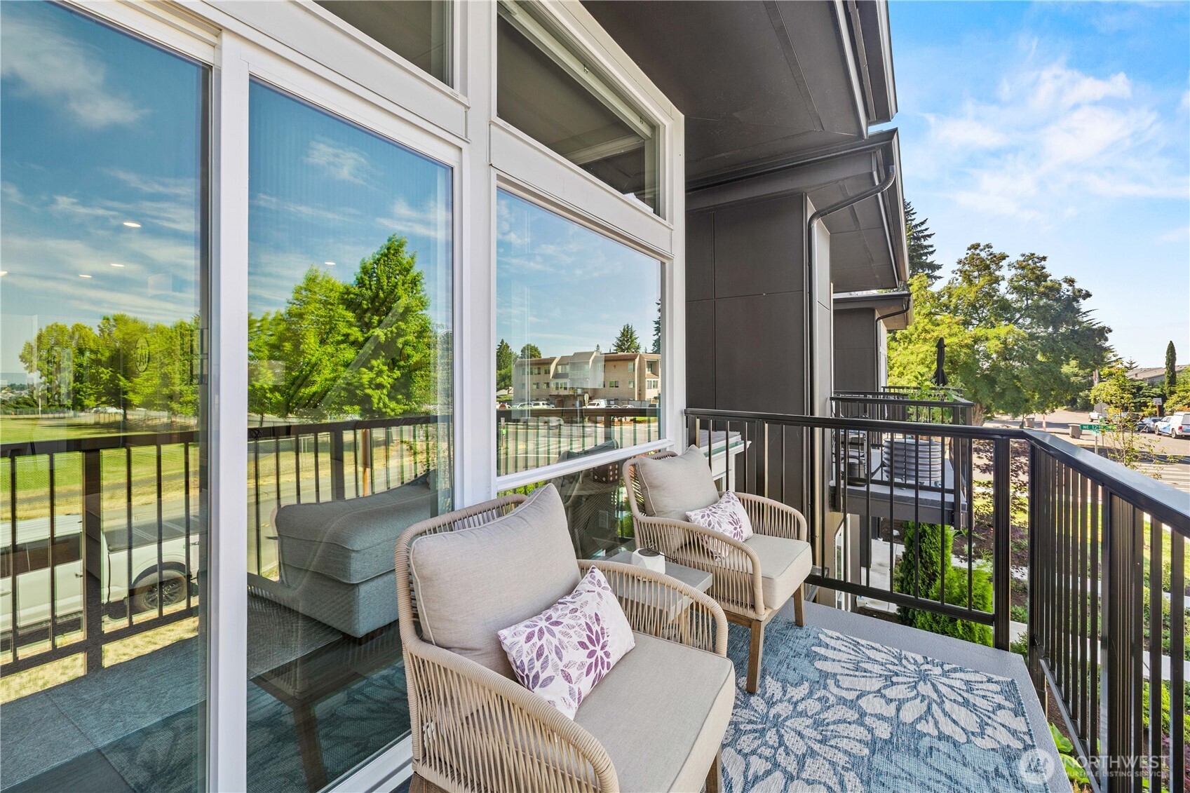 1208 Harrington Avenue Northeast Renton, WA 98056 - Photo 32 of 40 a view of a balcony with furniture