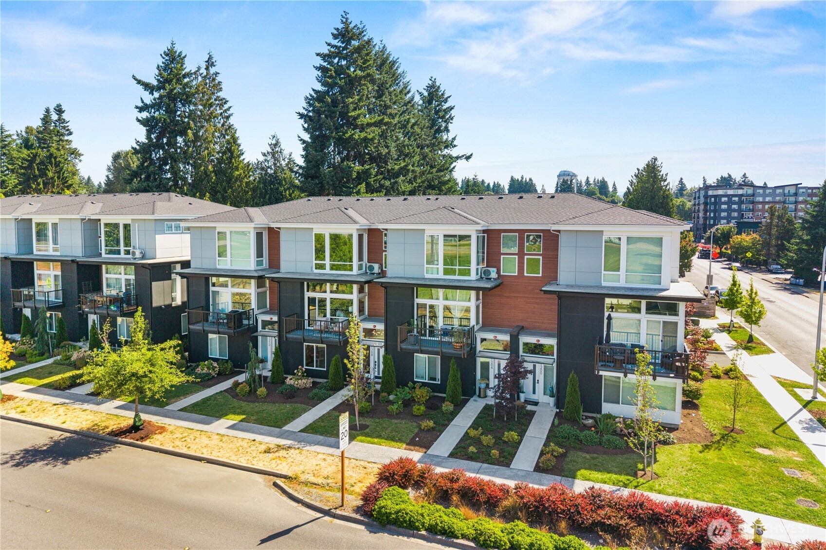 1208 Harrington Avenue Northeast Renton, WA 98056 - Photo 38 of 40 a front view of a house with a yard