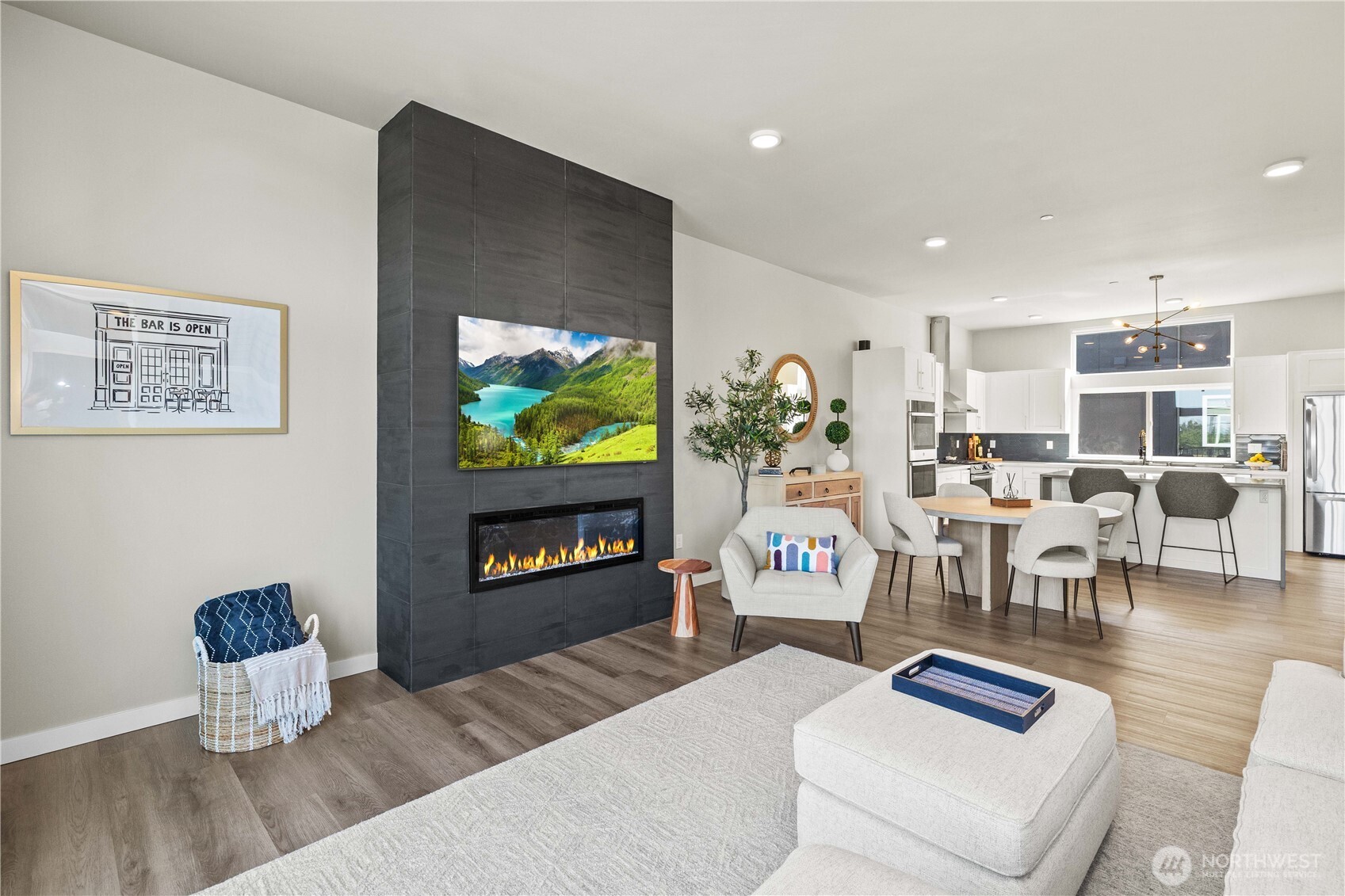 1208 Harrington Avenue Northeast Renton, WA 98056 - Photo 7 of 40 a living room with furniture and a flat screen tv