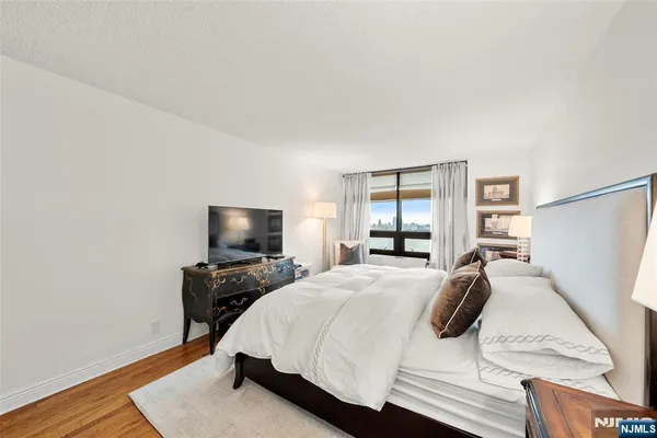 a view of bathroom with dual sinks