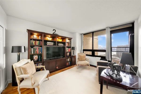 a bathroom with a toilet sink and vanity