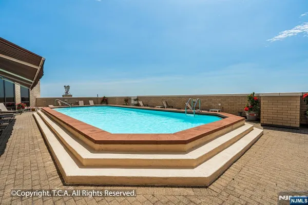 a balcony with a city view