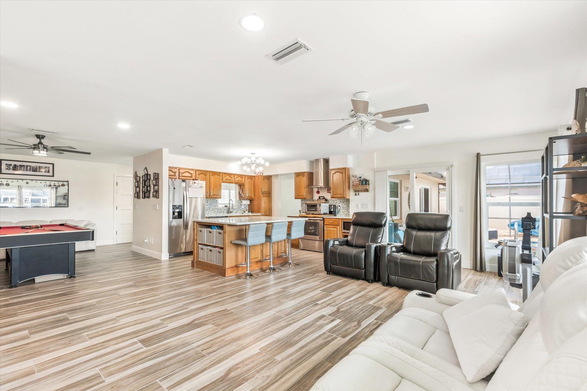 5 Cheyenne Court Palm Coast, FL 32137 - Photo 16 of 58 a living room with furniture and a table