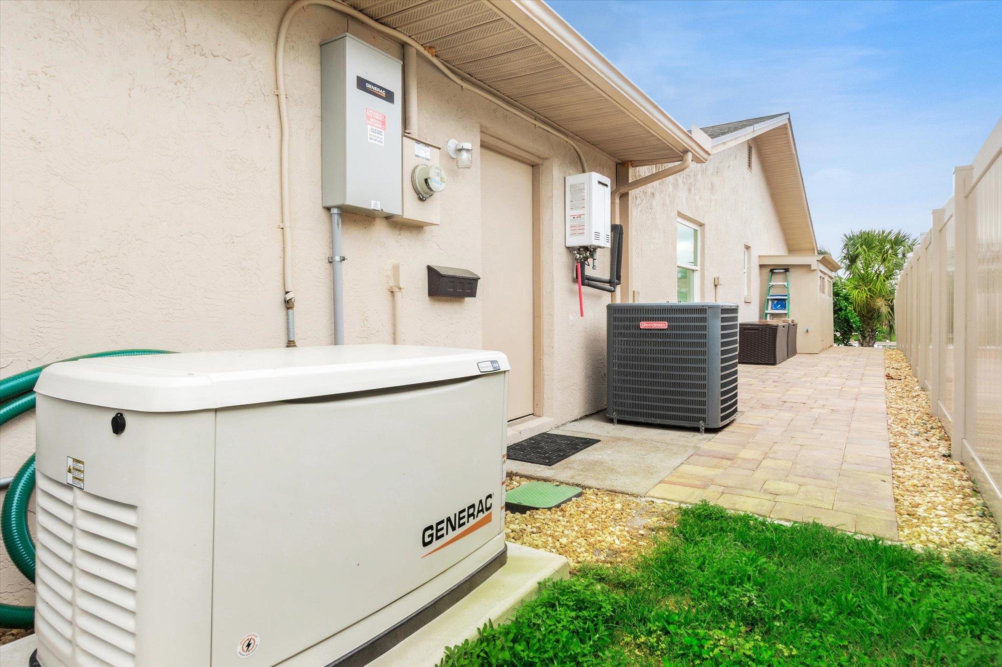 5 Cheyenne Court Palm Coast, FL 32137 - Photo 38 of 58 a bathroom with a sink a mirror and shower