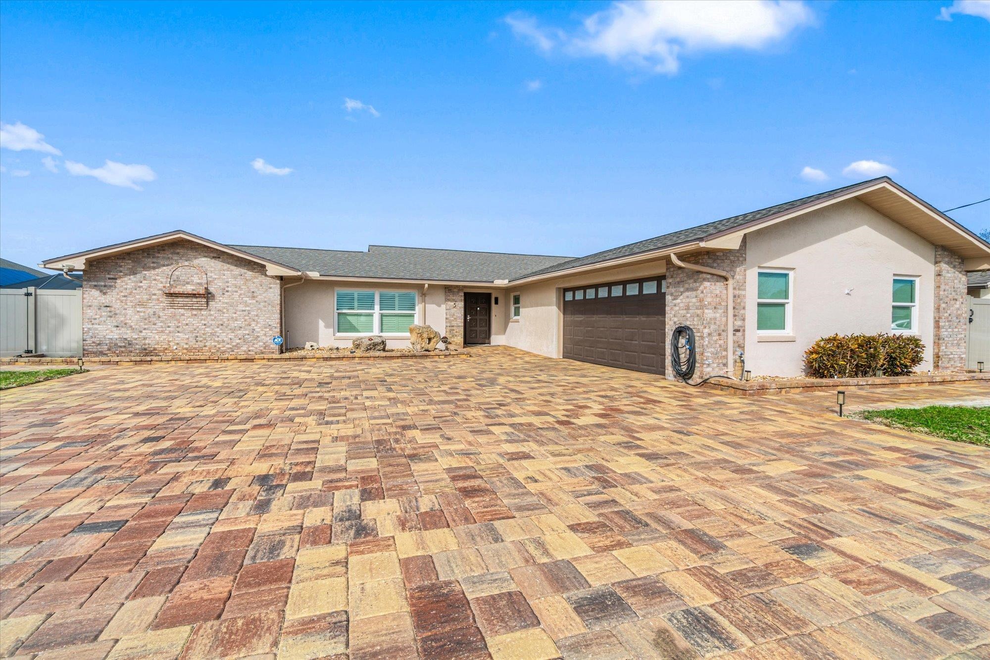 5 Cheyenne Court Palm Coast, FL 32137 - Photo 41 of 58 a view of a house with a yard