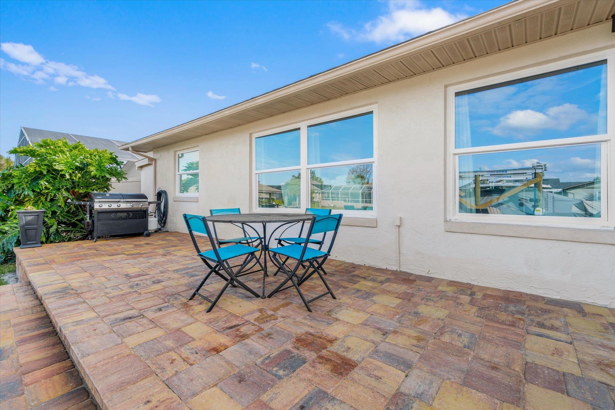 5 Cheyenne Court Palm Coast, FL 32137 - Photo 46 of 58 a view of a chairs and table in the patio