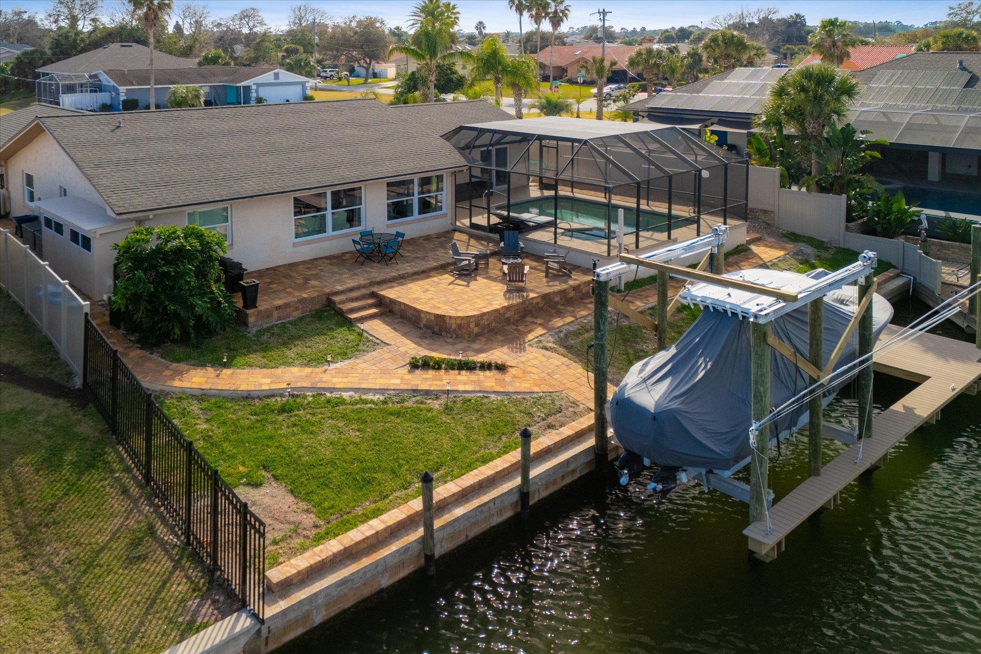 5 Cheyenne Court Palm Coast, FL 32137 - Photo 47 of 58 an aerial view of a house with swimming pool garden and patio