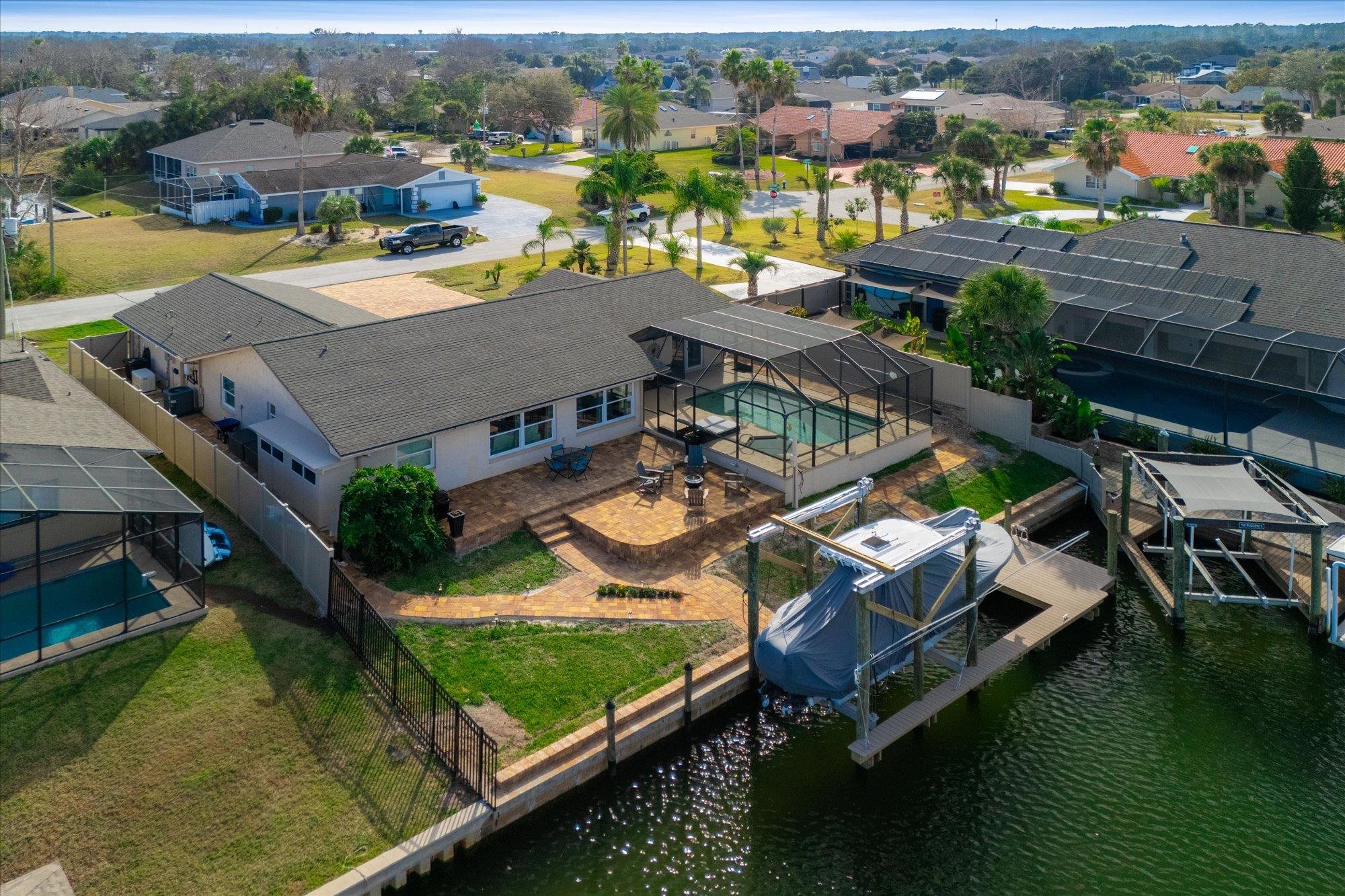 5 Cheyenne Court Palm Coast, FL 32137 - Photo 48 of 58 an aerial view of residential houses with outdoor space