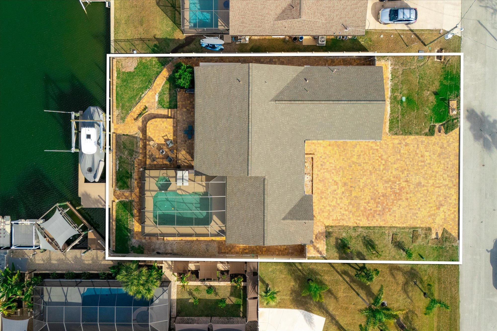 5 Cheyenne Court Palm Coast, FL 32137 - Photo 56 of 58 Aerial view of property and surrounding area with a pool area and property boundaries highlighted