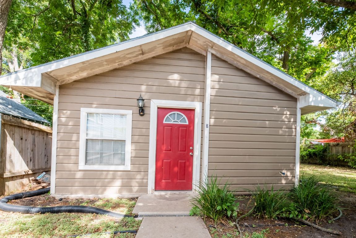 4704 Evans Avenue, Unit B Austin, TX 78751 - Photo 1 of 1 a front view of a house with garden