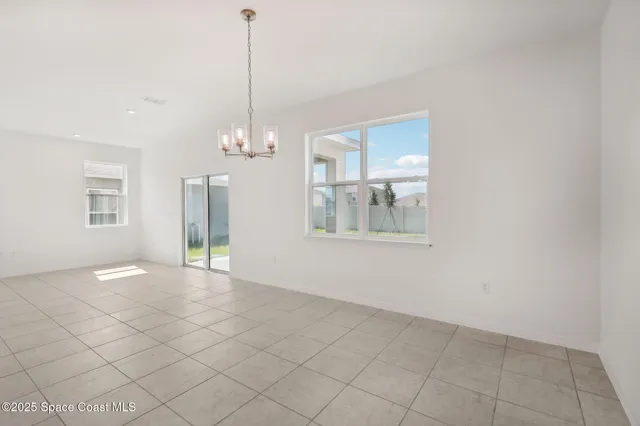 a view of an empty room with window