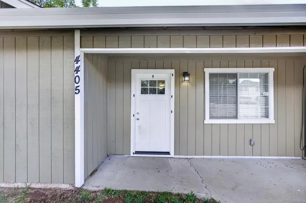 front view of a house with a yard