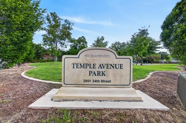 front view of a house with a fence