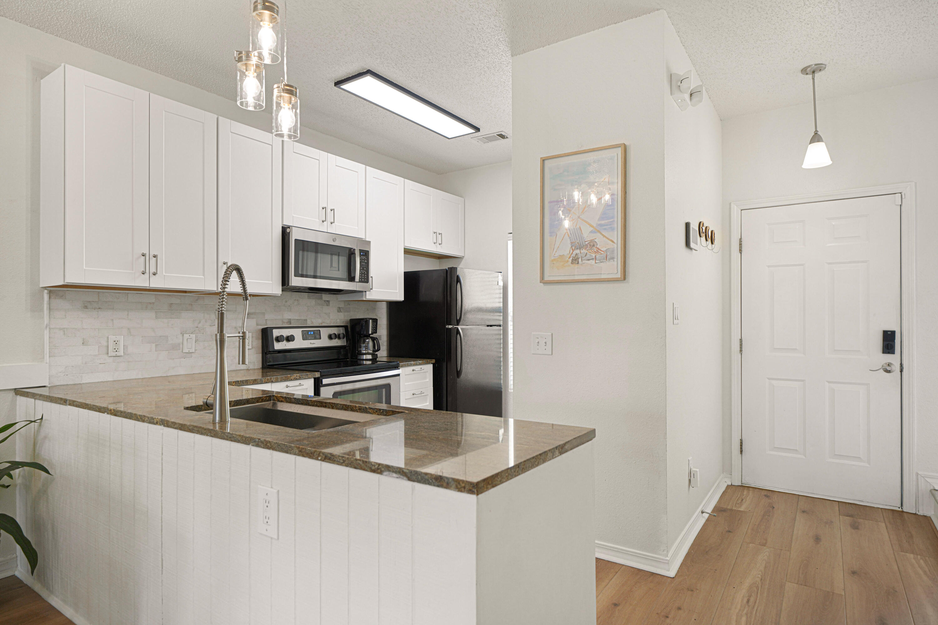 450 South Geronimo Street, Unit 102 Miramar Beach, FL 32550 - Photo 5 of 39 Kitchen/Entry