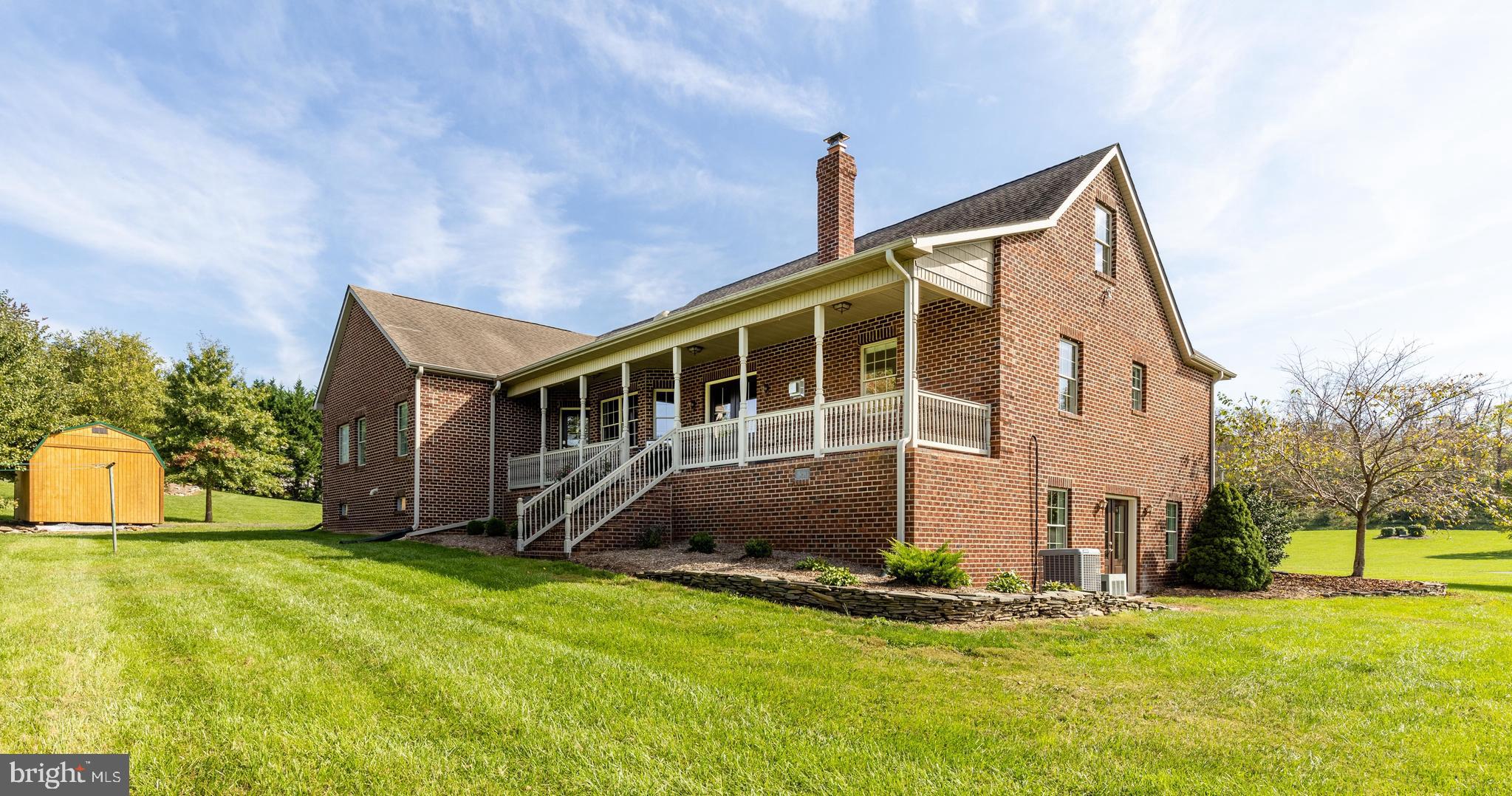 11710 Big Spring Road Clear Spring, MD 21722 - Photo 53 of 82 All Brick Covered Porch with a Mountain View!