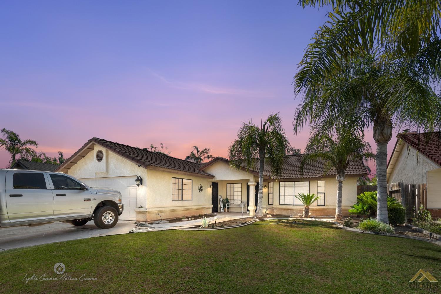 617 Orchid Drive Bakersfield, CA 93308 - Photo 1 of 1 a view of a house with a yard and sitting area