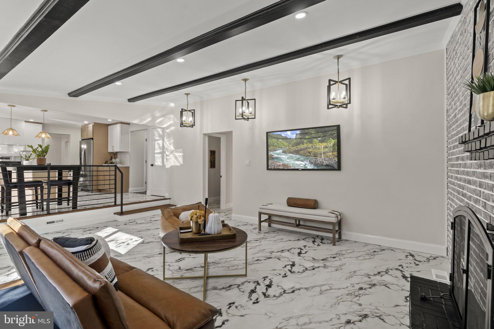 33 Millbridge Road Clementon, NJ 08021 - Photo 14 of 34 a living room with furniture and a table