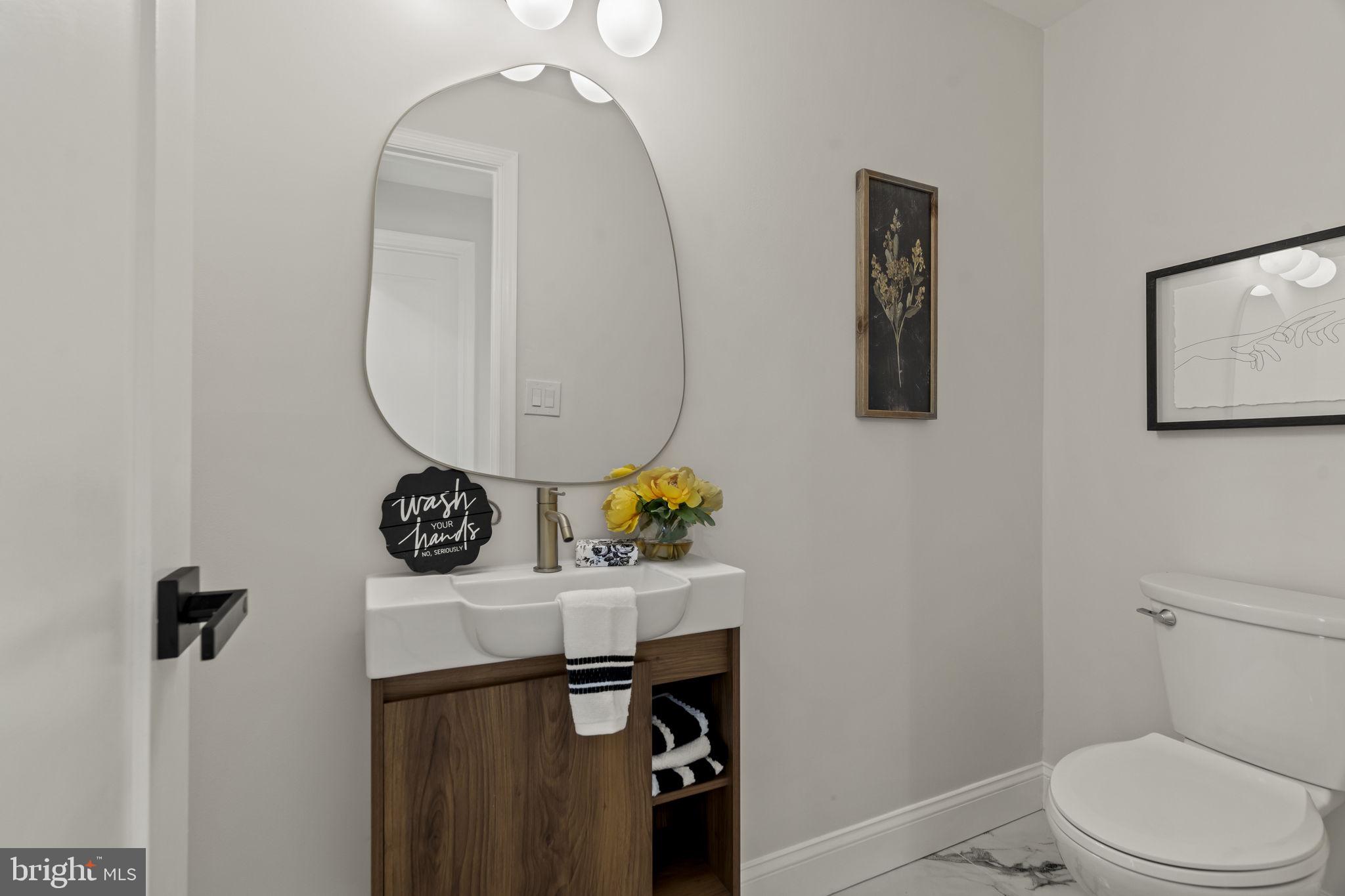 33 Millbridge Road Clementon, NJ 08021 - Photo 16 of 34 a bathroom with a toilet and a sink