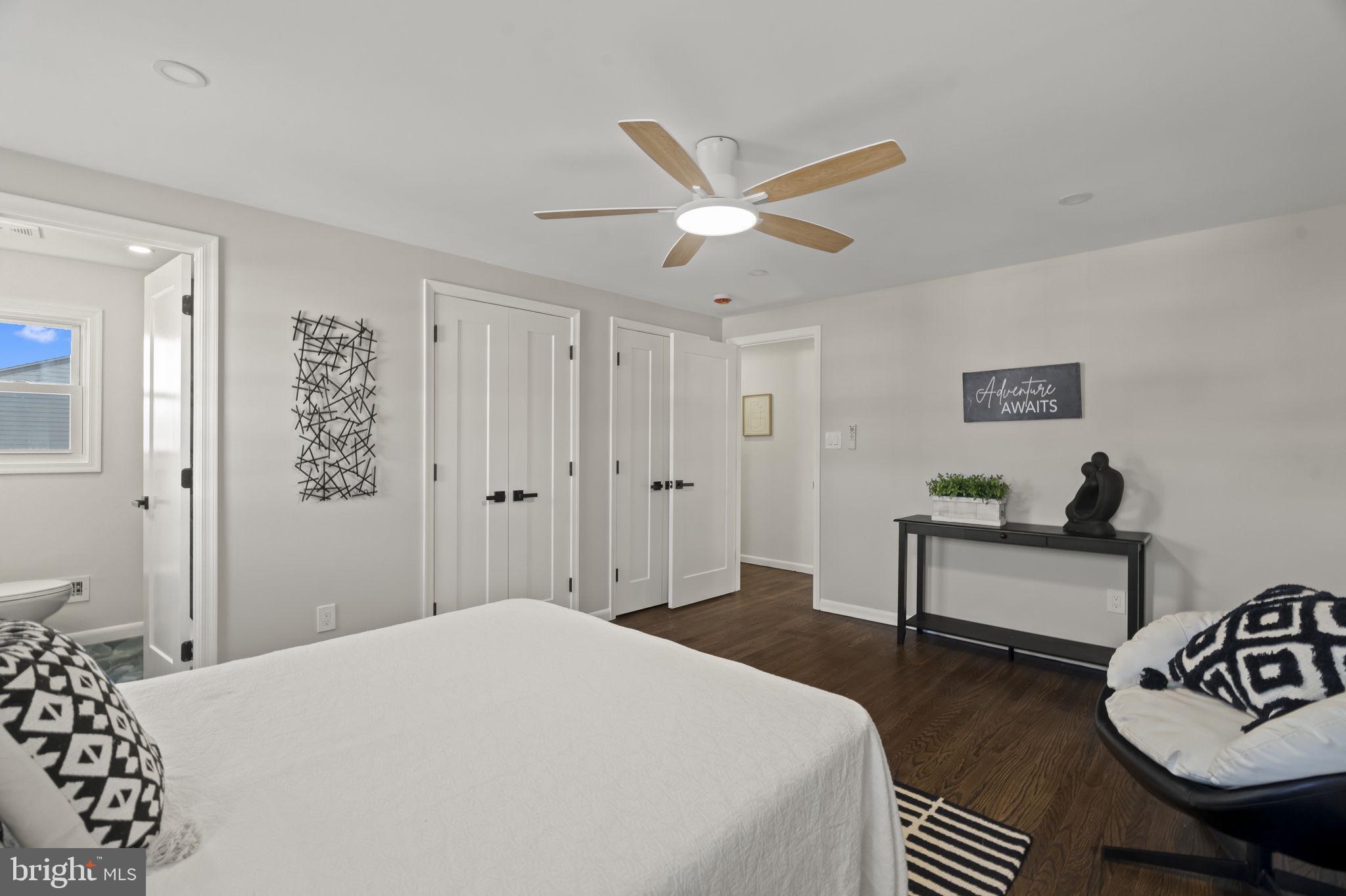 33 Millbridge Road Clementon, NJ 08021 - Photo 19 of 34 a bedroom with a bed and a chandelier