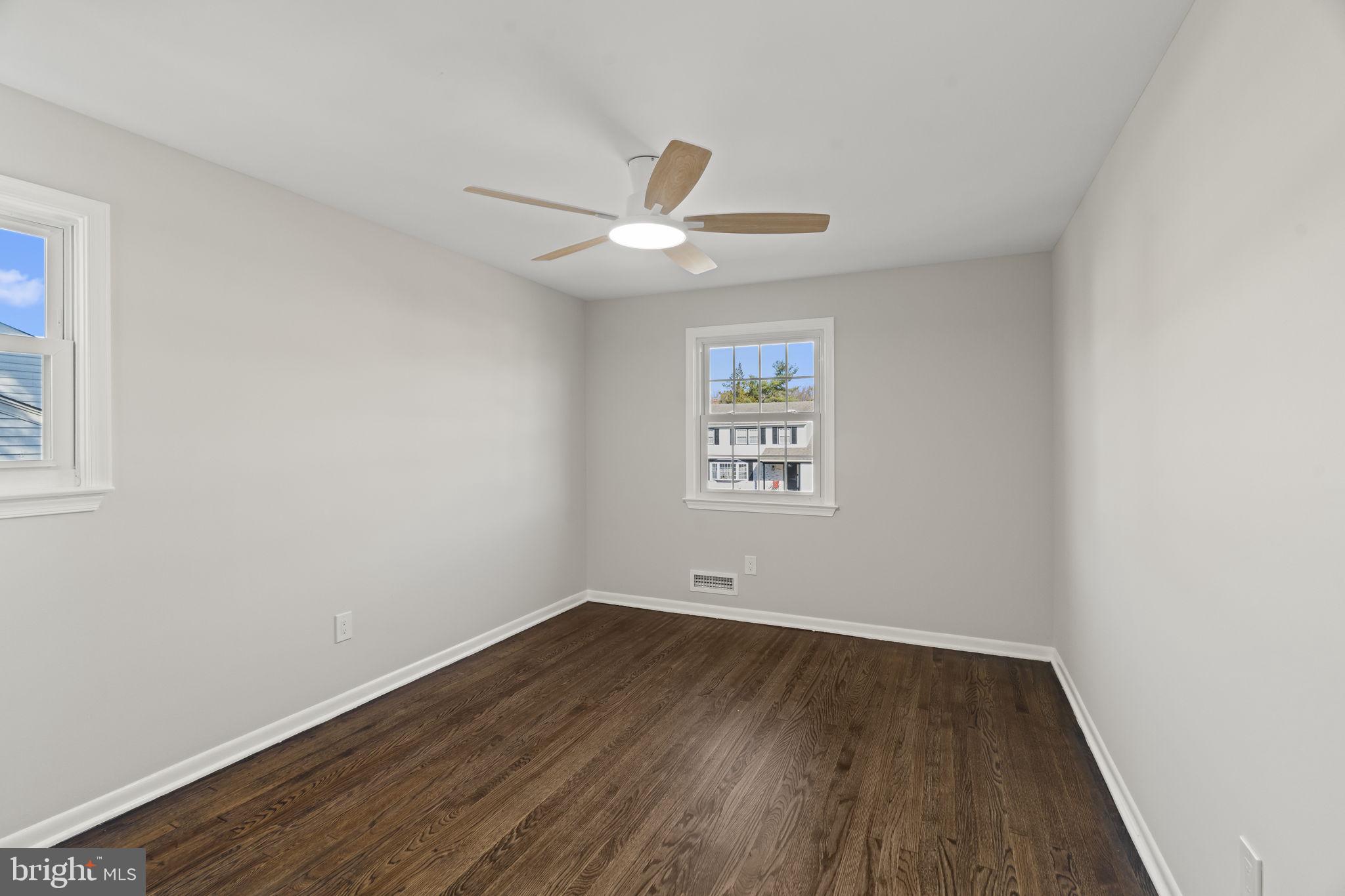 33 Millbridge Road Clementon, NJ 08021 - Photo 27 of 34 an empty room with wooden floor and ceiling fan