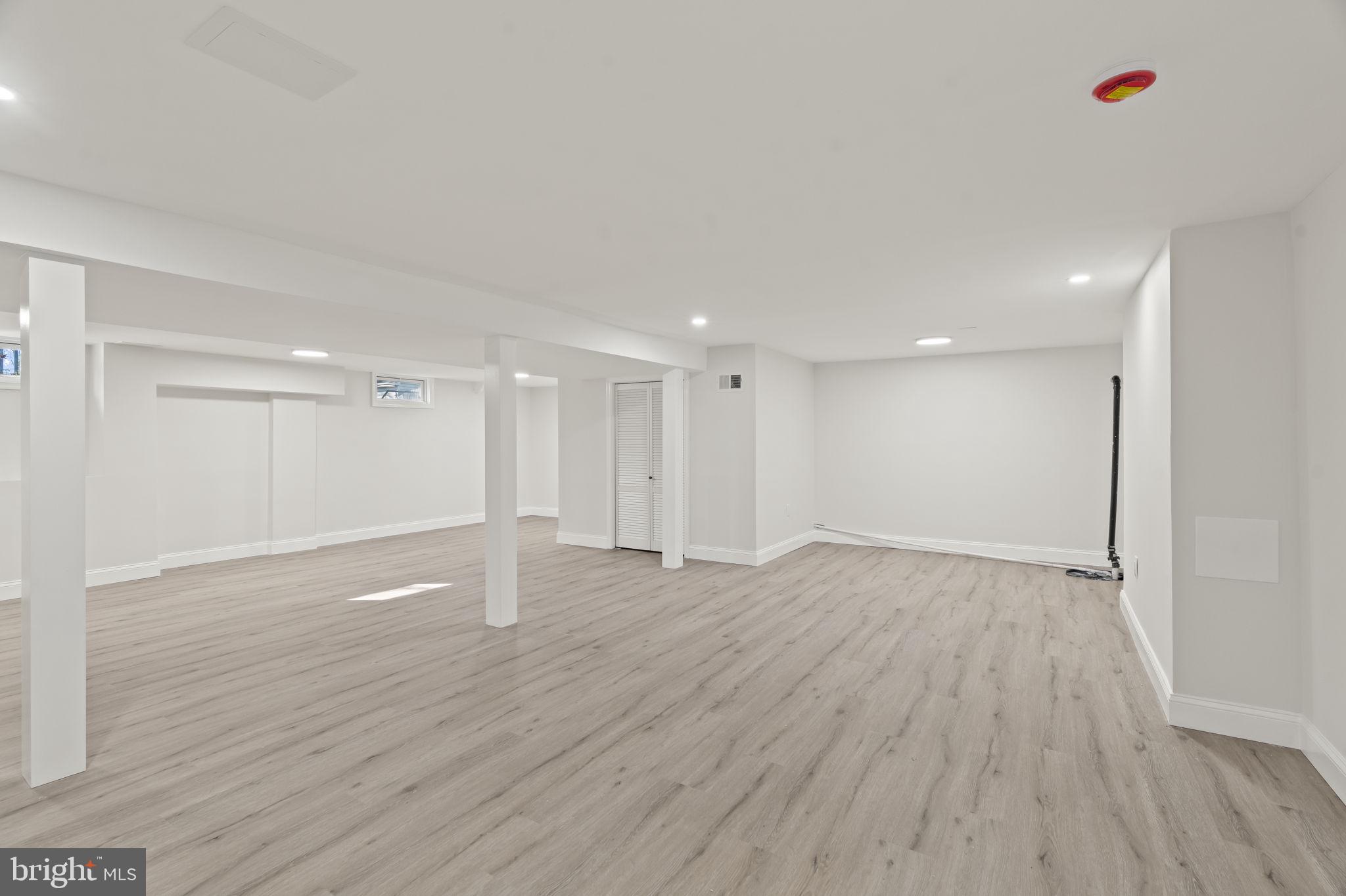 33 Millbridge Road Clementon, NJ 08021 - Photo 29 of 34 a view of an empty room with wooden floor