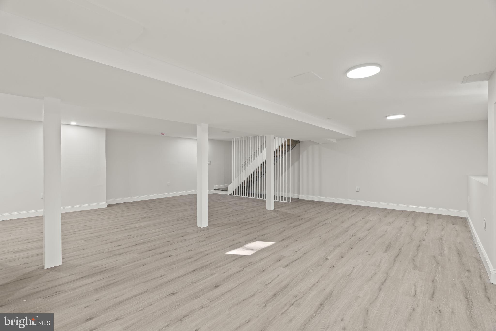 33 Millbridge Road Clementon, NJ 08021 - Photo 30 of 34 a view of empty room with wooden floor