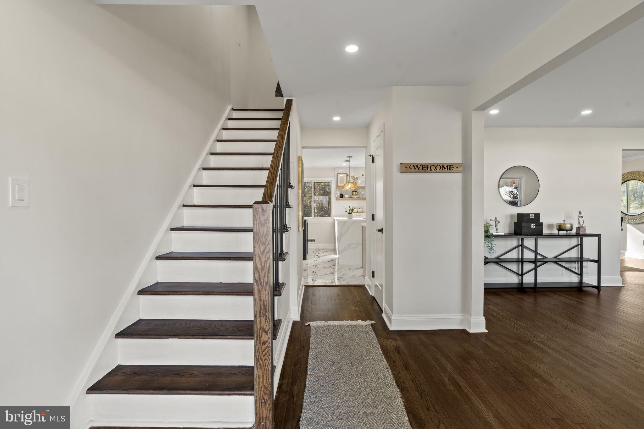 33 Millbridge Road Clementon, NJ 08021 - Photo 3 of 34 a view of entryway and hall with wooden floor