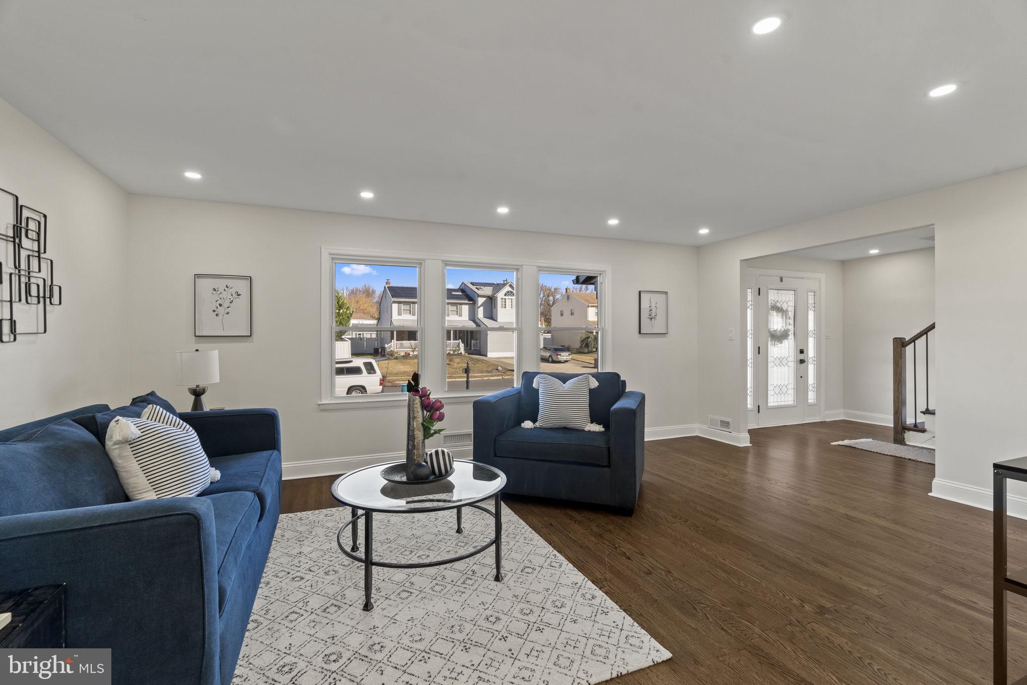 33 Millbridge Road Clementon, NJ 08021 - Photo 4 of 34 a living room with furniture and wooden floor