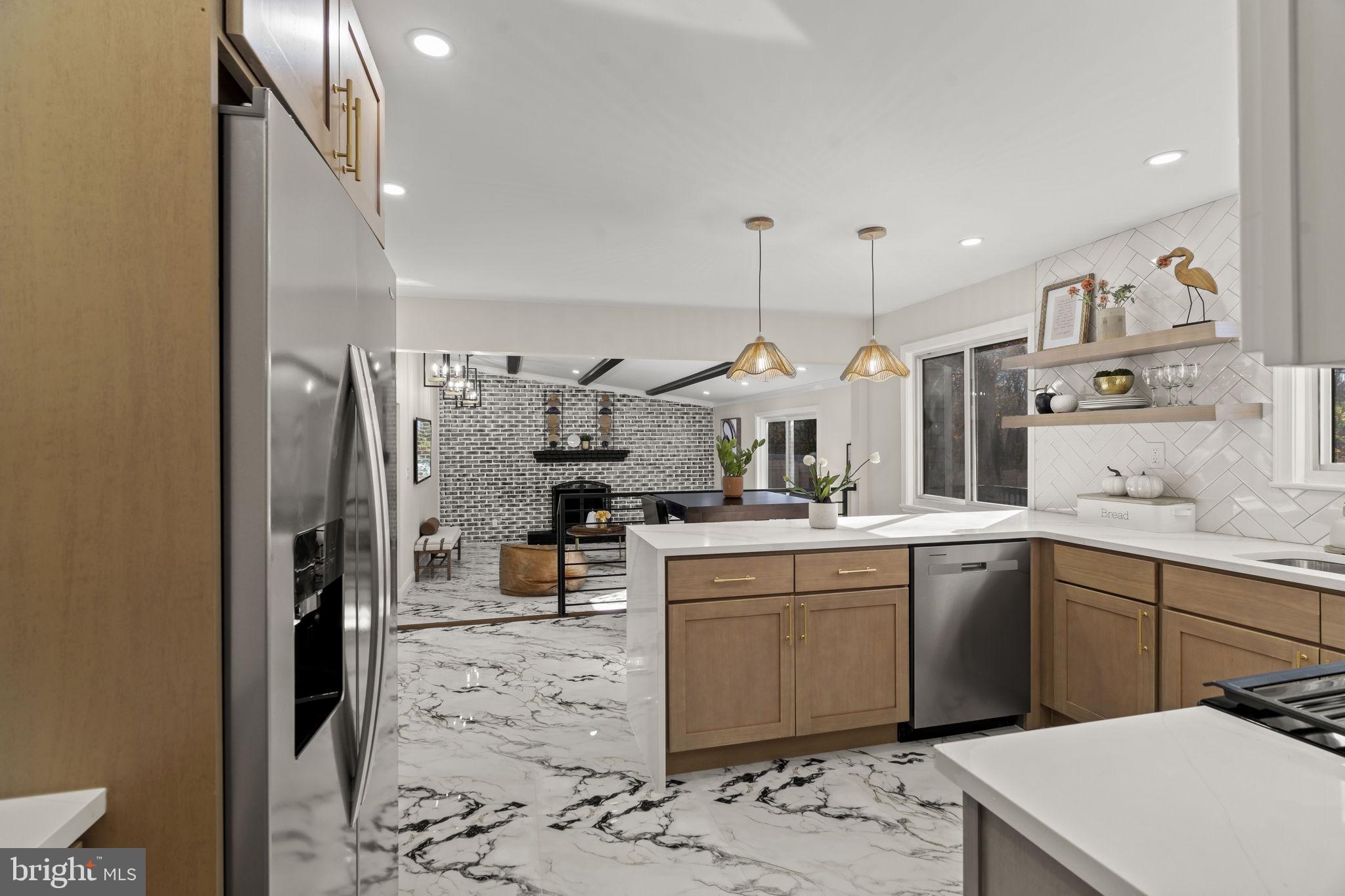 33 Millbridge Road Clementon, NJ 08021 - Photo 10 of 34 a kitchen with a sink a counter top space and stainless steel appliances