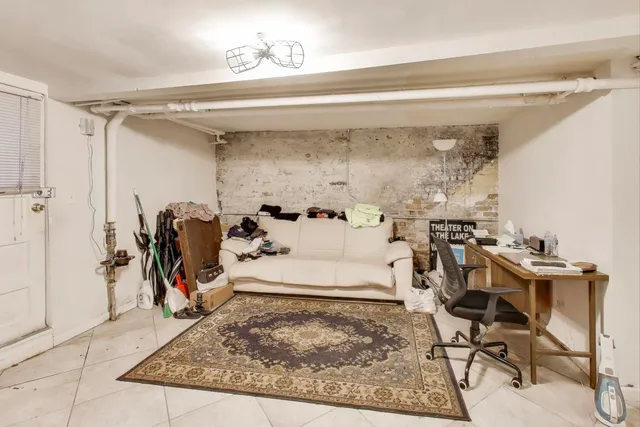 a view of a living room and dining room